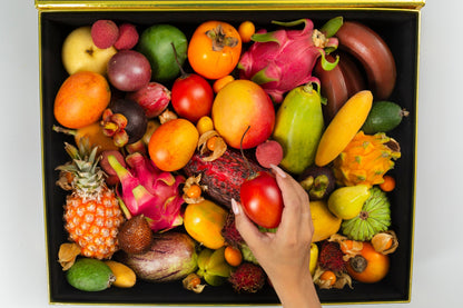 Large Exotic Fruit Variety Box Open W/hand